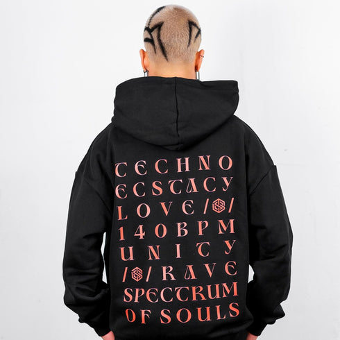 "Unity" Ultra Heavy Hoodie in schwarz von Technostoff, Rückansicht, getragen von Raver