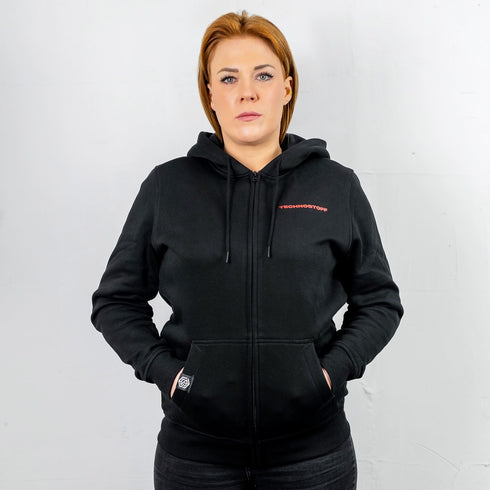 Rave Girl trägt "Red Headed" Premium Zip Hoodie von Technostoff in schwarz, Vorderansicht