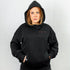 "Unity" Ultra Heavy Hoodie in schwarz von Technostoff, Vorderansicht, getragen von Raver Girl