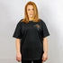 Rave Girl mit schwarzem Being Human oversized T-Shirt in schwarz von Technostoff