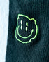 Distorted Smile Stick auf schwarzer Socke für Raver, Close Up Aufnahme