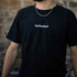 Technostoff Embroidery Backseam T-Shirt mit Stick auf der Brust und Detailprints in schwarz