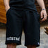 Mann mit Technostoff nocturnal Shorts unisex in schwarz