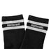 Technostoff nocturnal College Socken in schwarz mit weißen Streifen freigestellt