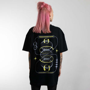 Female raver with pink hair wearing Technostoff Eternal Cycle T-shirt, back view with back print