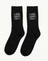 Schwarze "Line Dance" Socken von Technostoff, Mockup Seitenansicht