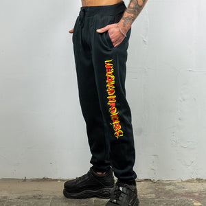 Raver wearing black Technostoff Being Human Stripe sweatpants, side view
