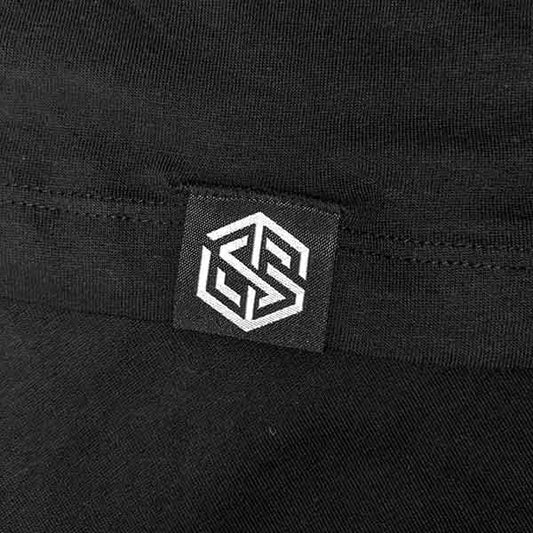 Detail view of the premium Technostoff label on a streetwear piece.