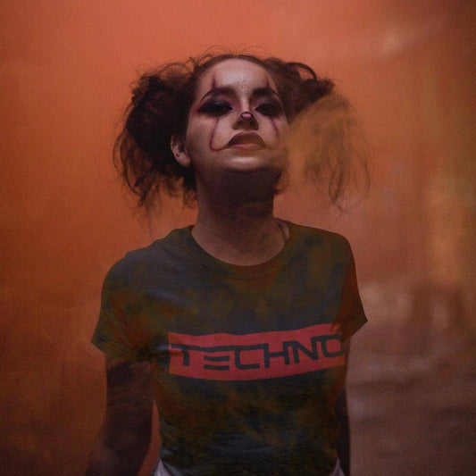 Female raver in Technostoff Red Techno Stripe T-shirt with rave make-up in red fog