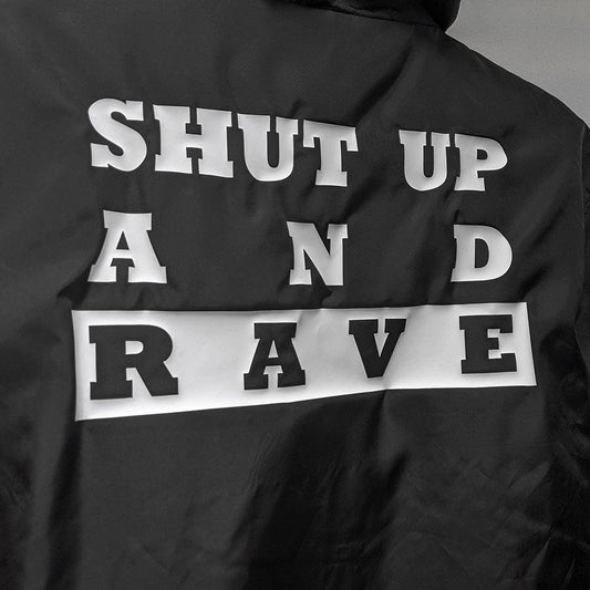 Black Technostoff Shut Up And Rave windrunner, close-up of back print